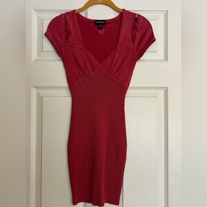 Bebe Bodycon dress with cutouts